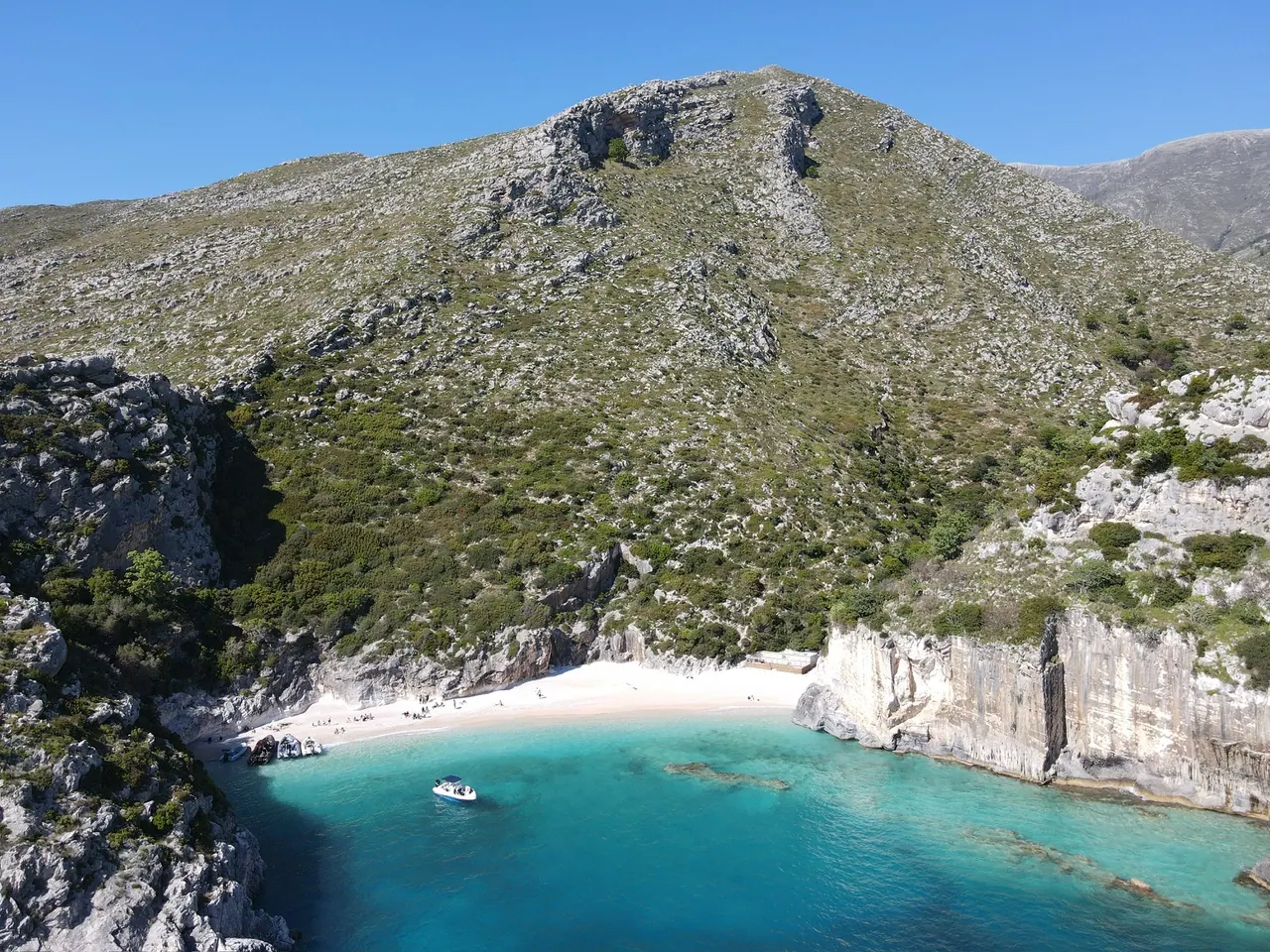 Towering white limestone cliffs at Gramma Bay